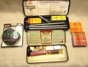 lot 13 image: Outers gun cleaning kits, Hoppes brass bore jag kit, and Otis shotgun cleaning kit