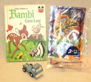 lot 47 image: Walt Disney Bambi 1972 copyright, 1970 Tootsie toy, and 3D game action figure