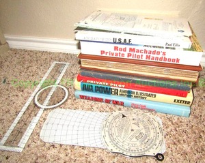 lot 74 image: Pilots avaiation books and navigation tools