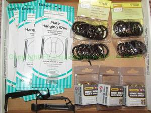 lot 83 image: Household hardware including hanging plate wires, grommets plus