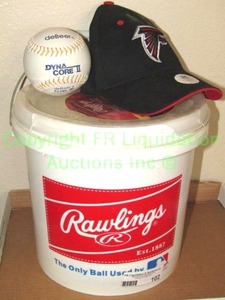 lot 102 image: Rawlings bucket of baseballs, and NFL Atlanta Falcons hat