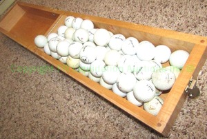 lot 113 image: Solid wood hinged lid box filled with golf balls
