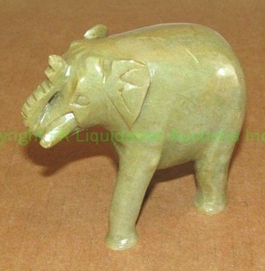 lot 219 image: Green soap stone elephant, approx. 4 tall
