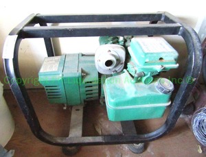 lot 282 image: Coleman Powermate electric generator model RM54-2000
