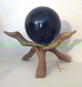 lot 273 image: Purple glass orb on wood display stand
