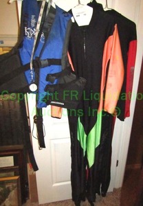 lot 160 image: Life vest and divers diveskins (3 total)