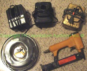 lot 211 image: Bostitch brad mail gun, cordless battery chargers, Craftsman trimmer line