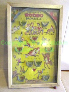 lot 261 image: Vintage 1930s Poosh-M-ups Rodeo Bagatelle table game