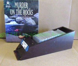 lot 188 image: Murder on the rocks mystery puzzle game and playing card dealer