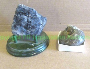 lot 197 image: Polished blue petrified wood from west Texas and Ammonite fossil from North Africa
