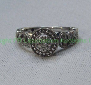 lot 315 image: Zales diamond engagement ring