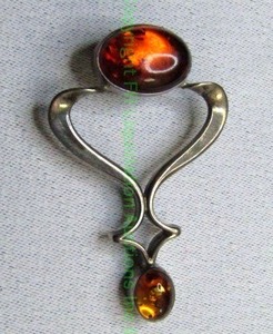 lot 240 image: Sterling silver and Amber stone pendant