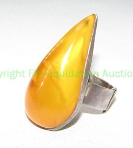 lot 237 image: Sterling silver ring with large tear drop amber stone
