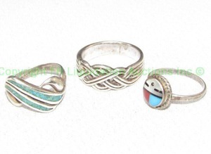 lot 236 image: Sterling silver rings with precious stones, one is Zunni style