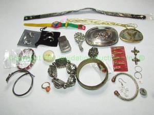 lot 85 image: Assorted fashion jewelry, belt buckles and more as shown