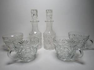 lot 23 image: 2 Matching small Crystal Decanters w 4 matching Crystal Cups w handles