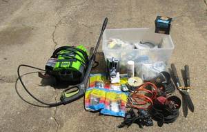 lot 31 image: Greenworks power washer, Quoizel outdoor light fixture, Stakes, a lot of misc. electrical supplies