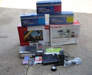 lot 35 image: new open box s19&nbsp flat screen tv w travel car cord, large toner cartridges 6120, wireless all in one printer, misc. computer items