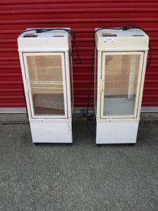 lot 53 image: 2 Commercial Show Case Refrigerators &amp 2 wet floor signs