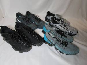 lot 87 image: 4 pairs Nike running shoes