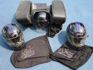 lot 138 image: 3 motorcycle helmets &amp Leather saddle bags