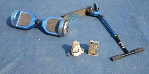 lot 145 image: Hover board, scooter, vintage ninja hamster, vintage Reno NV slot machine