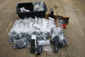 lot 149 image: very large lot of retail security tags and equipment