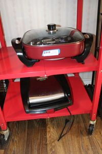lot 11 image: Curtis Stone 12 Electric Non-Stick Skillet and Johnsonville Sizzling Sausage Grill