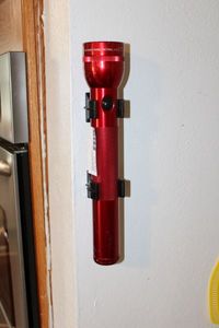 lot 20 image: Red Mag-Lite Flashlight