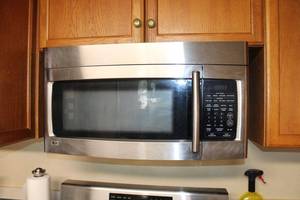lot 26 image: LG Microwave Oven Model LMV1630ST (must bring tools to remove)