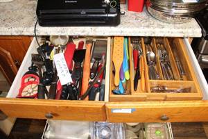 lot 29 image: Silverware Set and Kitchen UtensilsBBQ Utensils