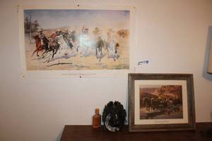 lot 86 image: Crossing the Stream Print by John Leone, Horse Wall Plaque, Flask with Leather Sheath, and Remington Poster