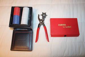 lot 81 image: Tommy Hilfiger Poker Set Unopened, Cardinal Dominoes, and Leather Hole Punch