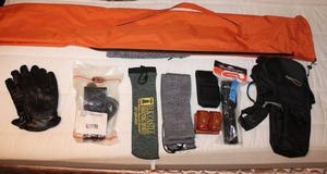 lot 73 image: Gun Accessories Gun Bags, Leather Holsters (Some Unopened in Packaging), and Leather Gloves
