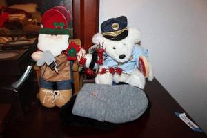 lot 94 image: Vintage Shearling Policemans Cap size 7 14,  Dickies Hat, Musical Police Bear Sings Stop, and Plush Santa in Rocking Chair