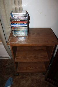 lot 100 image: DVD War Movie Collection and Rolling Cart