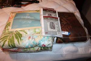 lot 107 image: Tobago Queen Comforter Floral Pattern, 3 Suit Bags, and Brown Floral Pattern Blanket