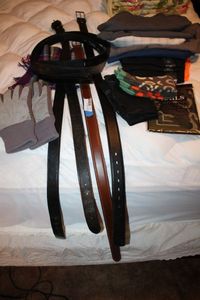 lot 105 image: Leather Belts, Winter Gloves, Mens Shorts Size 42 and T-shirts Unused