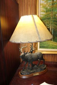 lot 114 image: Cast Iron Elk Statue Desk Lamp, Marked Mountain Music by Tim Wolfe