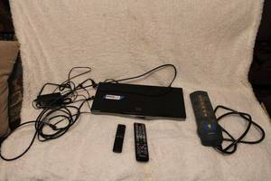 lot 152 image: Samsung Blue-Ray Disc Player with Remote and Surge Protector