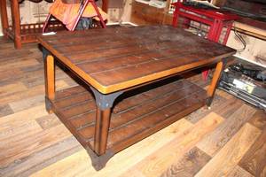 lot 181 image: Crown Mark Inc. Coffee Table features Wood Panel Design with Metal Corner Brackets, 48W x 26D x 20T