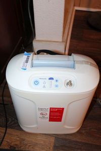 lot 164 image: Inogen at Home Oxygen Concentrator Machine Model GS-100