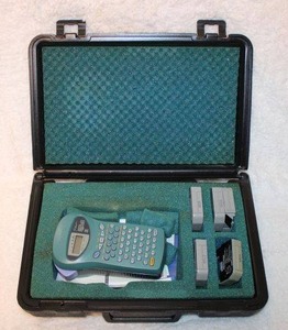 lot 182 image: Brother Label Maker  P-Touch with Tapes White, Silver, Gold and Blue Colors