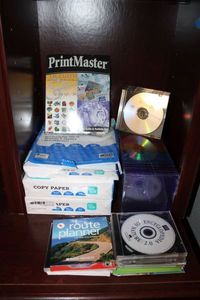 lot 173 image: Copy Paper, Unopened Pack of CDs, and Print Master Program and Guide Book