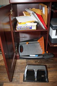 lot 176 image: Fiskars Paper Cutter, Hole Punch, Shipping Envelopes, and CD Stomper Pro CD-R Labeling System