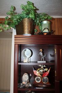 lot 172 image: United States Marines Personalized Thermometer Desk Clock, Paper Weights, and Scentsy Wax Melt Light