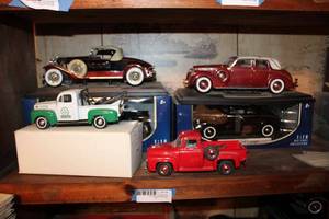 lot 138 image: Model Cars 1937 Lincoln Touring Cabriolet, 1940 Ford Coupe, Red Ford Pick Up Truck, 1949 Ford City Service Wrecker, 1930 Packard Boattail Speedster, and 1940 Ford Pickup