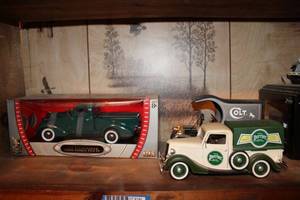 lot 140 image: Model Cars Perrier Truck, Colt Fire Arms Truck, and 1937 Studebaker Coupe Express Pick Up in Box
