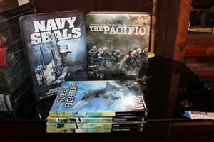 lot 146 image: DVDs The Pacific, Navy Seals, Jets, Subs, Tanks, and US Navy Carriers