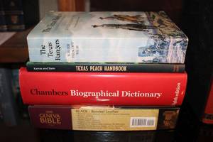 lot 149 image: Books The Texas Rangers, Texas Peach Handbook, Biographical Dictionary, 1599 Geneva Bible